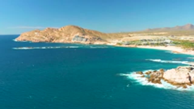 CHILENO BEACH LOS CABOS BCS MEXICO-2022: Waves Crashing on Rocky Coastal Shoreline
