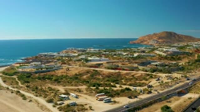 CHILENO BEACH LOS CABOS BCS MEXICO-2022: Coastal Area with Moving Vehicles and Buildings