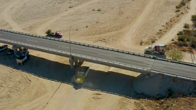 CHILENO BEACH LOS CABOS BCS MEXICO-2022: Vehicles Traveling Across Desert Bridge