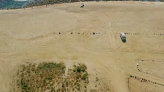 CHILENO BEACH LOS CABOS BCS MEXICO-2022: Vehicle and People Moving on Sandy Beach