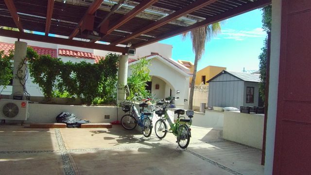EAST CAPE LOS CABOS BCS MEXICO-2022: Patio with Bicycles and Vining Greenery