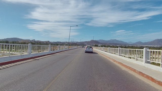 EAST CAPE LOS CABOS BCS MEXICO-2022: Vehicles Traveling on a Bridge Road