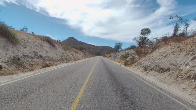 EAST CAPE LOS CABOS BCS MEXICO-2022: Paved Road Winding Through Arid Hills