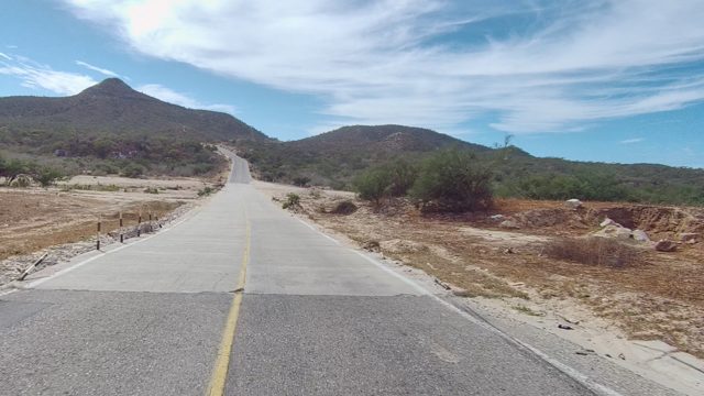 EAST CAPE LOS CABOS BCS MEXICO-2022: Paved Road Through Arid Mountain Terrain