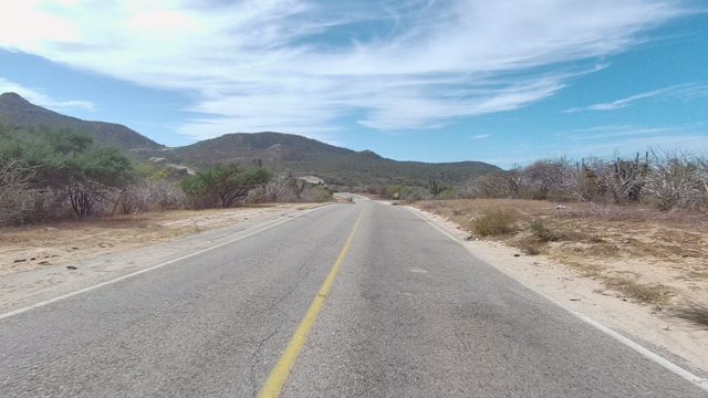 EAST CAPE LOS CABOS BCS MEXICO-2022: Paved Road Winding Through Dry Desert Terrain