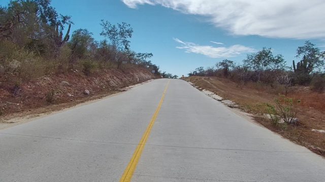 EAST CAPE LOS CABOS BCS MEXICO-2022: Paved Road Through Arid Bushland
