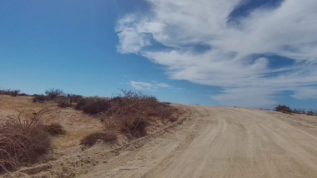 EAST CAPE LOS CABOS BCS MEXICO-2022: Dirt Road Through Arid Desert Terrain