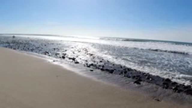 TRESTLES BEACH CALIFORNIA-2019: Waves Of The Ocean On A Beach With Sand And