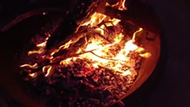 TRESTLES BEACH CALIFORNIA-2019: Bucket With Fire And Ash In The Darkness Of The Night