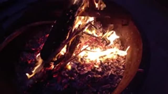 TRESTLES BEACH CALIFORNIA-2019: Fire Burning Strong Inside A Barrel