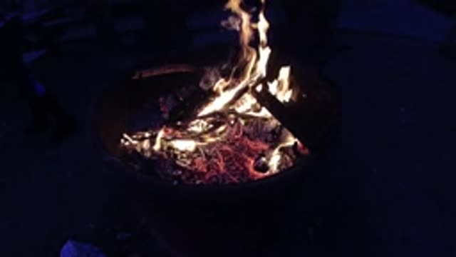TRESTLES BEACH CALIFORNIA-2019: Hard Wood Campfire Burning Slowly In A Pinch