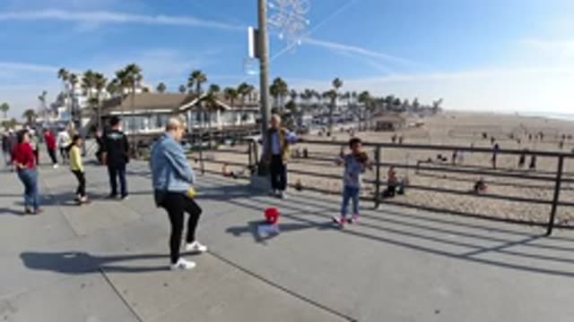 HUNTINGTON BEACH CALIFORNIA-2019: Young Boy Captivates With Live Performance