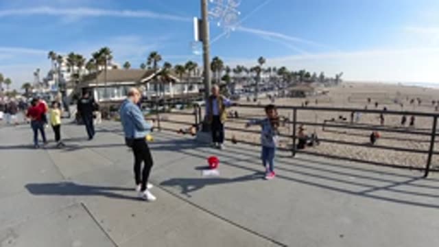 HUNTINGTON BEACH CALIFORNIA-2019: Talented Boy Performs Music on the Beach