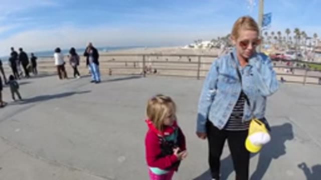HUNTINGTON BEACH CALIFORNIA-2019: A Slow Motion Crowd of People Standing