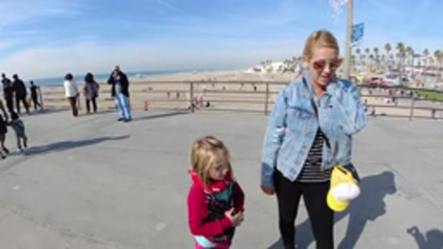 HUNTINGTON BEACH CALIFORNIA-2019: Family Trip To A Beach Spot On A Cold Day
