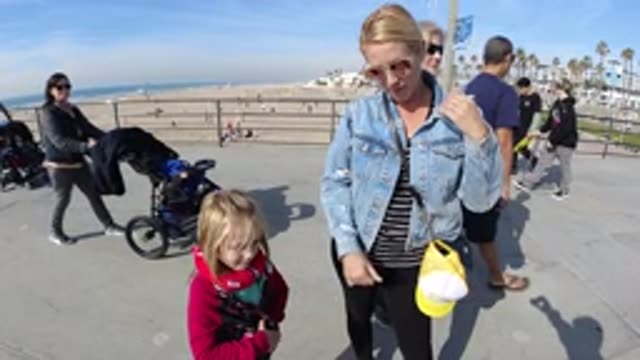 HUNTINGTON BEACH CALIFORNIA-2019: Children With Their Mom At The Park