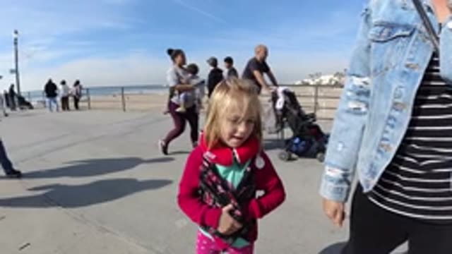 HUNTINGTON BEACH CALIFORNIA-2019: Cute Little Girl Standing At A Park With