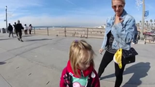 HUNTINGTON BEACH CALIFORNIA-2019: A Baby And Her Mother Exploring Nature