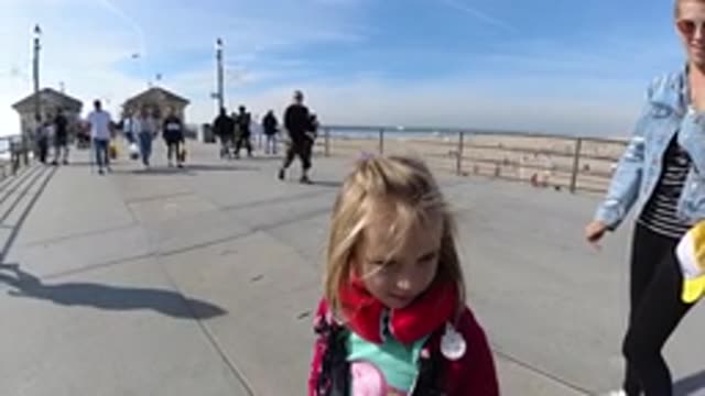 HUNTINGTON BEACH CALIFORNIA-2019: A Happy Beautiful Kid Looking At The Camera