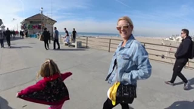 HUNTINGTON BEACH CALIFORNIA-2019: Family on Pier at the Beach