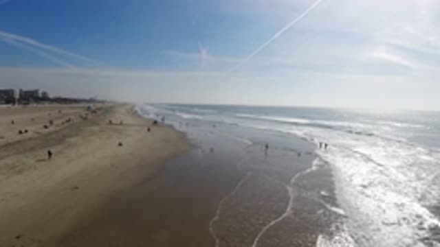 HUNTINGTON BEACH CALIFORNIA-2019: A Beach Near Buildings With A Beautiful