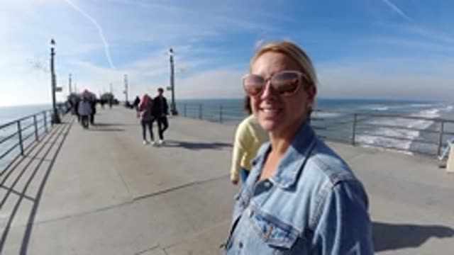 HUNTINGTON BEACH CALIFORNIA-2019: The Wandering Mind Of Tourists Can Never Stop