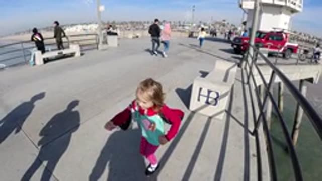 HUNTINGTON BEACH CALIFORNIA-2019: A Beautiful Sight Of A Happy Girl With A