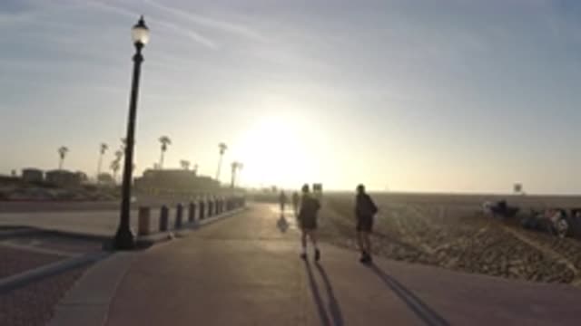 HUNTINGTON BEACH CALIFORNIA-2019: People Embark On Jogging As The Sun Starts To Rise