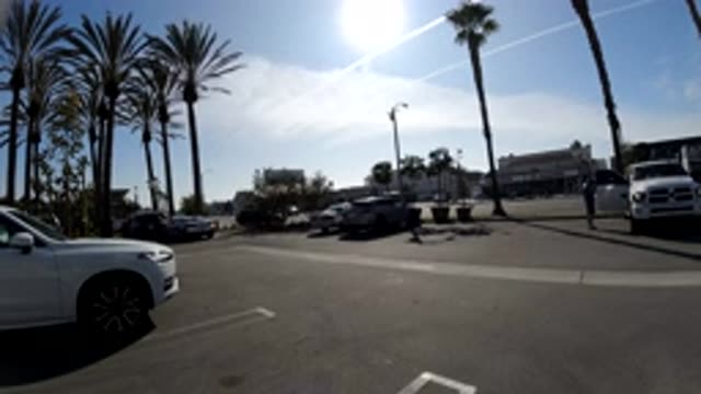 HUNTINGTON BEACH CALIFORNIA-2019: Road In A City With Cars Driving On It During