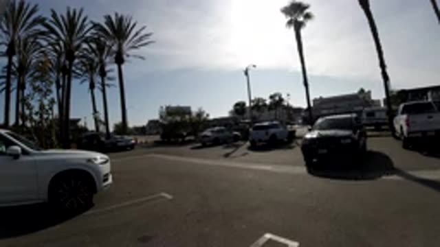 HUNTINGTON BEACH CALIFORNIA-2019: Parking A SUV With A Passing Car