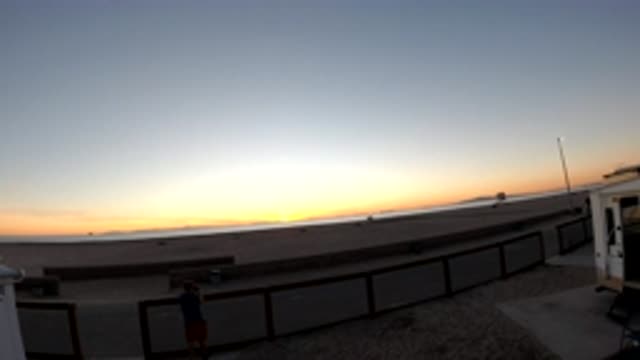 BOLSA CHICA CALIFORNIA-2019: Sunset In Distance Park Or Recreation Area People