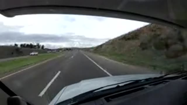 CENTRAL COAST CALIFORNIA-2019: Life On The Fast Lane A Car Is Speeding Down The Highway