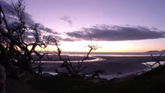 PISMO BEACH CALIFORNIA-2019: The Ocean At Night At The Shore With Clouds