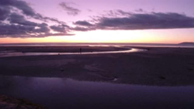 PISMO BEACH CALIFORNIA-2019: A Person Walking In A Quiet Place While Sun Set