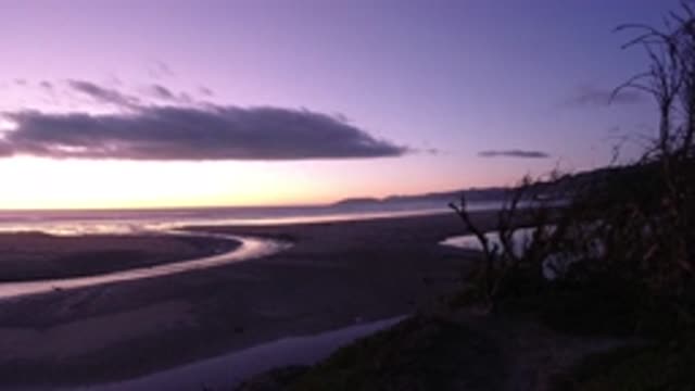 PISMO BEACH CALIFORNIA-2019: Sunset Footage Of The Beach With A River Meeting