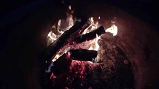 PISMO BEACH CALIFORNIA-2019: A Flame Burning Firewood in the Night