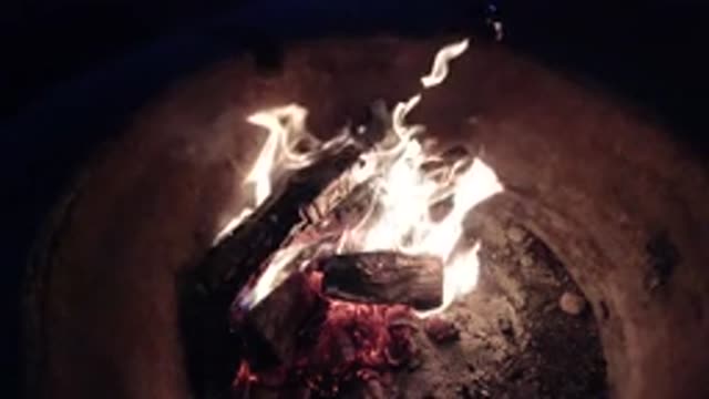 PISMO BEACH CALIFORNIA-2019: Raging Campfire In A Basin With Very Little With A