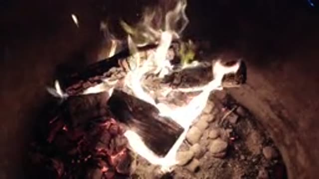 PISMO BEACH CALIFORNIA-2019: People Build A Fire For Warmth In Winter