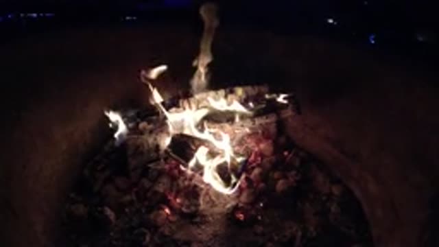 PISMO BEACH CALIFORNIA-2019: Fire Burning Bright At The Center Of The Camp