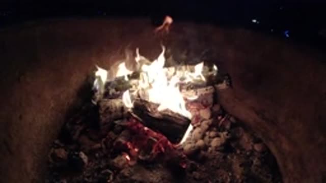 PISMO BEACH CALIFORNIA-2019: Wood Burns In A Container To Make Ambient Warmer