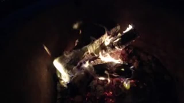 PISMO BEACH CALIFORNIA-2019: Mesmerizing Flames Burning Logs Slowing But