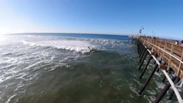 PISMO BEACH CALIFORNIA-2019: Ocean White Cap Water Pier Lights Freedom Surf