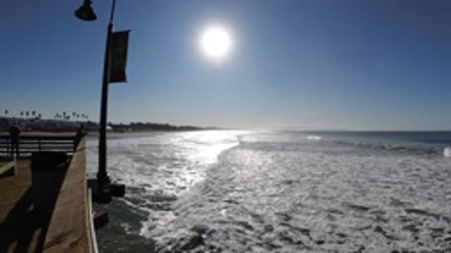 PISMO BEACH CALIFORNIA-2019: Sun Set As The Tide Rises During Summer Time At Shoreline