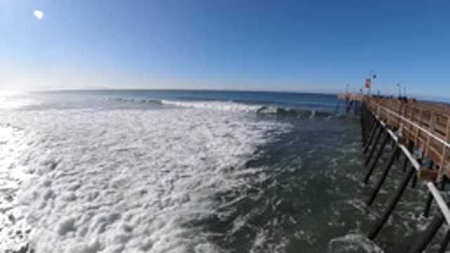 PISMO BEACH CALIFORNIA-2019: Sea Bed Milky Waves Raising Widely On Hole Land