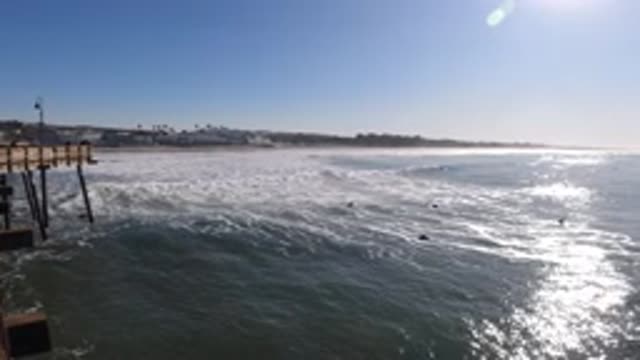 PISMO BEACH CALIFORNIA-2019: A Beautiful Sunset On Beach Where Waves In Ocean