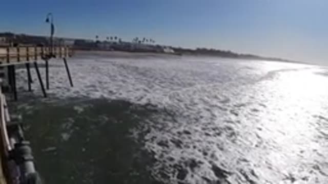 PISMO BEACH CALIFORNIA-2019: Aerial Shot Over The Coastal Waves At The Pier