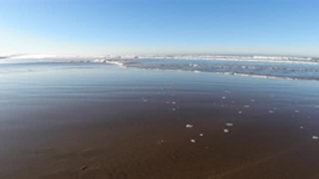 PISMO BEACH CALIFORNIA-2019: Small Steady Ocean Waves Coming In And Going Out