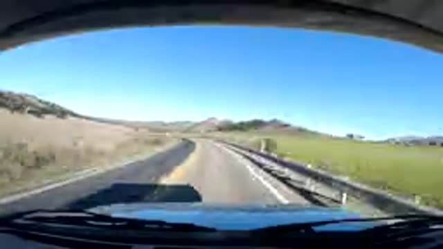 CENTRAL COAST CALIFORNIA-2019: Rapid Approaching Mountains And Green Trees On A Sunny Day