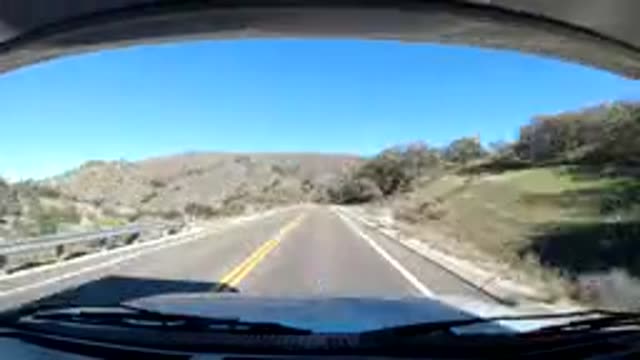CENTRAL COAST CALIFORNIA-2019: Time Lapse of a Traveling Car on an Empty Road