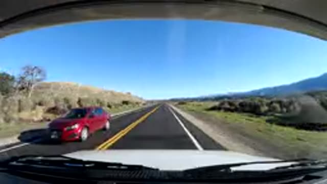 CENTRAL COAST CALIFORNIA-2019: A Vehicle Is Going Very Fast Down A Road Passing